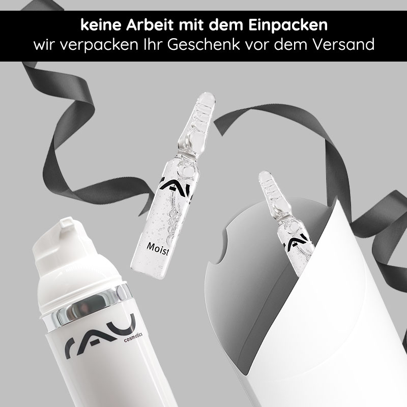 Scatola regalo "Pillow" con fiocco nero Geschenkverpackung mit schwarzer Schleife und RAU Cosmetics Produkten, inklusive einer Ampulle mit "Moist"-Label und einem weißen Behälter, ideal für besondere Anlässe.