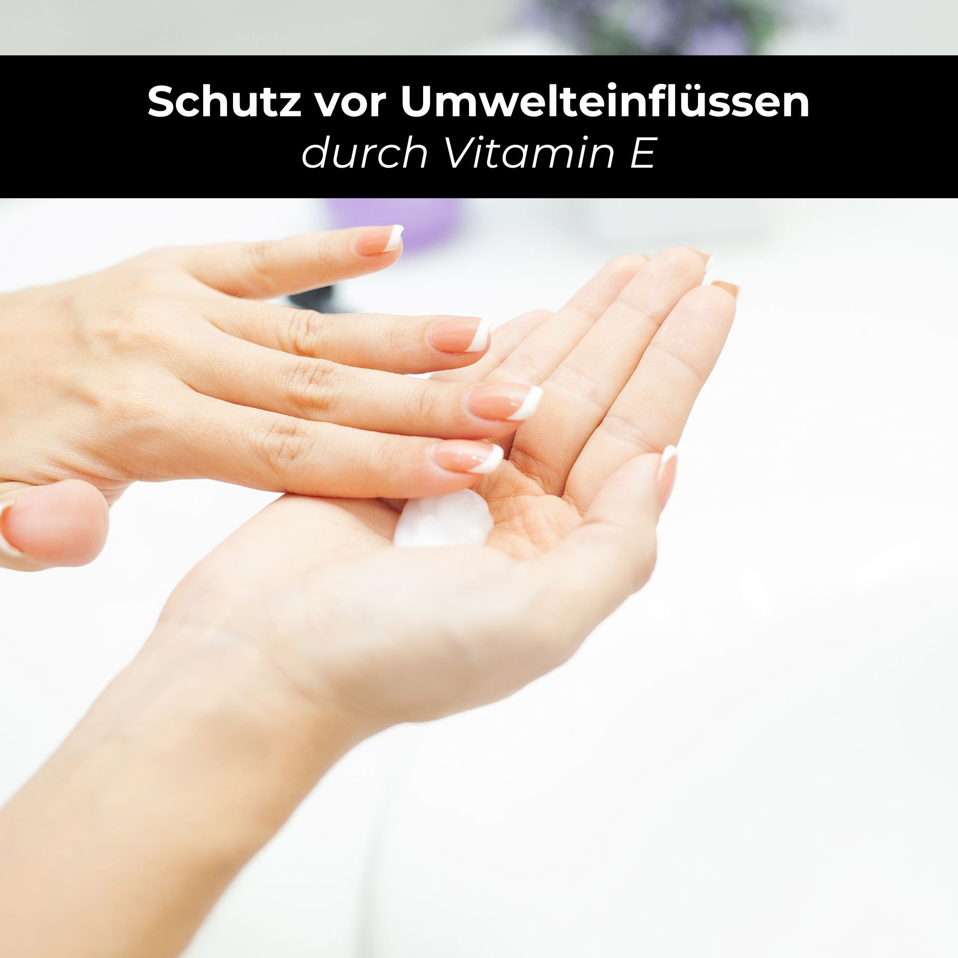 Mani che applicano una lozione idratante, con focus sulla protezione dagli influssi ambientali grazie alla vitamina E, adatta per la lozione corpo RAU Cosmetics per pelle secca.